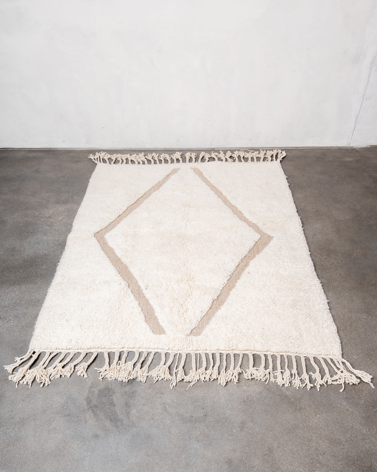 Modern, designer, handcrafted Berber rug from Morocco. Beniourain carpet with beautiful colours and patterns and fluffy wool texture.